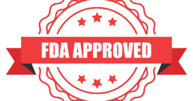 A red banner with the words FDA Approved written on it is pictured over a seal.