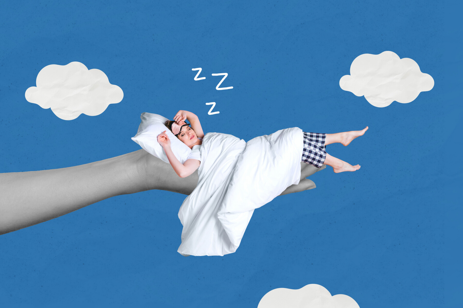 An image shows a person sleeping on a tree branch with clouds and a blue sky in the background.